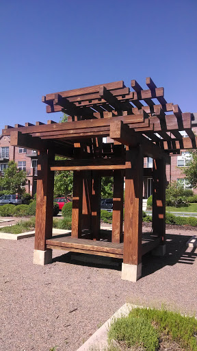 Wooden Bench with Unnecessarily Elaborate Shade Structure - Westminster, CO.jpg