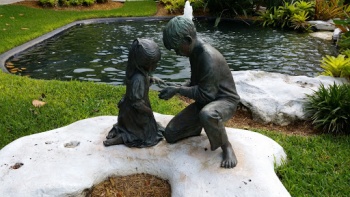 Boy Holding Bunny with Girl Statue - Miami Lakes, FL.jpg