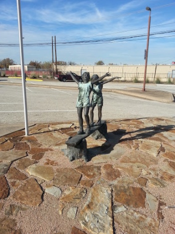 Balancing Children Statue - Arlington, TX.jpg