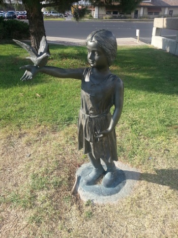 A Girl and her Dove Sculpture - Odessa, TX.jpg